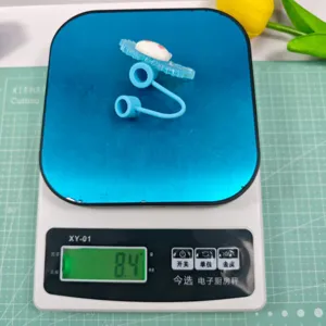 Cute cartoon acrylic straw topper dust cover detail view, lightweight design for daily use.
