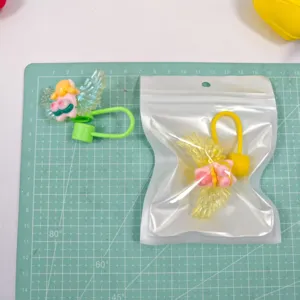Cute cartoon acrylic wings straw cover detail view, showing product craftsmanship and packaging.