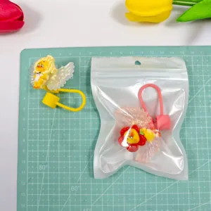 Cartoon acrylic wing straw cover detail, cute dust cap for reusable straws and cups.