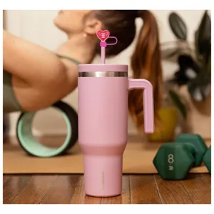 Pink insulated tumbler with handle and cute heart straw cover, perfect for daily fitness use.