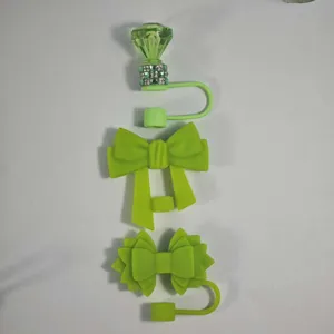 Food-grade silicone straw covers with cute bow and diamond designs, perfect tumbler dust plugs.