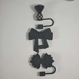 Black silicone straw covers and dust plugs set featuring cute bow and diamond designs for cups.