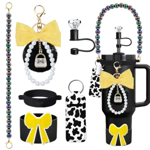 Tumbler accessories set with beaded handle strap, bow pom charm and cow print lipstick holder.