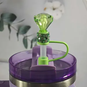 Green diamond silicone straw cover detail closeup, rhinestone straw topper for tumbler cups.