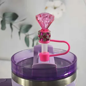 Pink rhinestone diamond straw cover detail shot, cute silicone dust plug for tumbler straw.