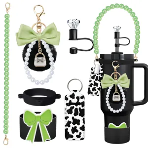 Accessories set for Stanley cup including bead strap, bow keychain, and straw topper.