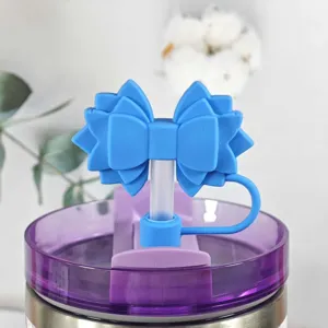 Detailed view of the blue silicone bow straw cover, perfect dust plug accessory for cups.