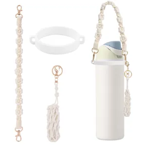 Handmade macrame water bottle strap with silicone ring and net pouch accessories for cups.