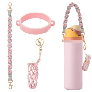 Handmade woven water bottle strap with silicone boot and lipstick net pouch accessory set.