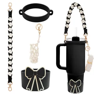 Handmade woven tumbler strap set with bow silicone sleeve and mini lipstick mesh pouch detail.