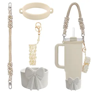 Handmade braided water bottle strap set with silicone bow boot and mini lip balm pouch.