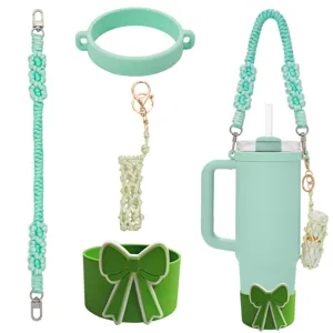 Handcrafted woven tumbler strap set with silicone boot, bow decoration and lipstick holder pouch.