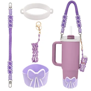 Handcrafted braided tumbler strap set with silicone boot and cute bow detail for daily use.