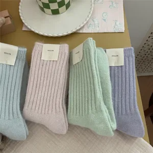 Cozy winter fleece ribbed mid-calf socks for women, thick warm solid color knit hosiery.