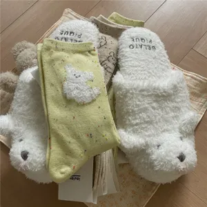 Fluffy plush slippers and cute dog patterned mid-calf socks set, warm and cozy winter home wear.