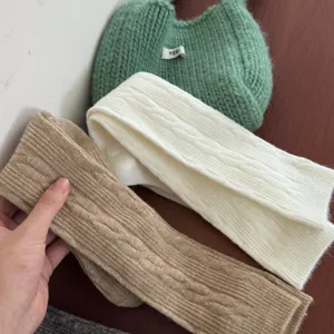 Detailed view of Japanese style cable knit leg warmers, soft and cozy winter socks for women.