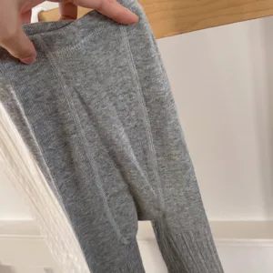 Grey ribbed cotton tights for women, breathable opaque pantyhose with stretchy comfort fit.