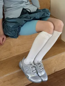 Solid white knee high sports socks activewear detail view soft breathable daily wear 80cm