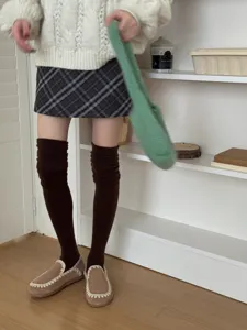 Cozy knit over-the-knee wool socks for women, perfect for autumn and winter daily warm wear.