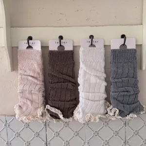 Knitted leg warmers with lace trim, sweet y2k style stacked socks for women winter autumn.