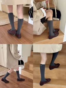 Korean style solid color mid-calf ribbed socks for women, casual soft cotton daily wear.
