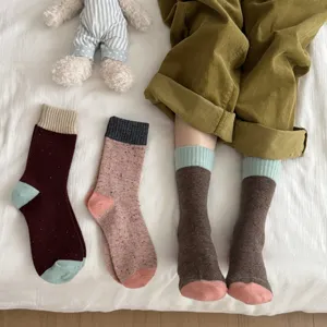 Thickened winter warm wool colorblock mid-tube socks, cozy daily casual detail view.