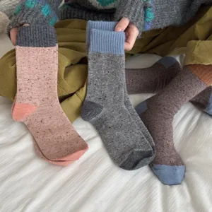 Merino wool colorblock mid-calf socks for winter warmth, cozy speckled knit design, 3 colors.