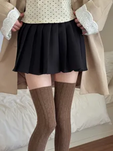 Detailed view of women's cable knit over-the-knee socks, sweet style, anti-slip design.