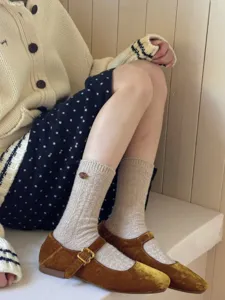 Japanese style wool mid-calf socks with cute button detail, cozy winter knit hosiery.