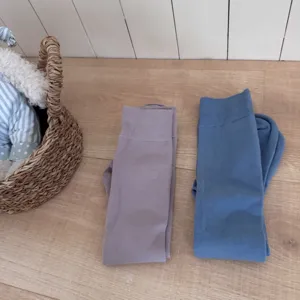 Solid color compression calf socks detail shot, cozy autumn winter long socks for daily wear.