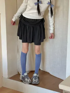 Blue solid color knee high socks for women, casual school style long socks daily wear.
