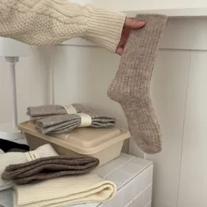 Cozy solid color ribbed wool mid-tube socks, winter warm and soft daily wear style.