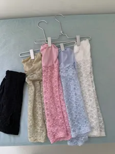 Detailed view of women's vintage floral lace ruffle socks available in multiple colors.