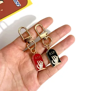 Halloween metal skeleton hand tombstone keychain couple bag pendant red black key ring