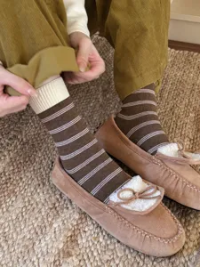 Retro striped mid-calf socks detail showing cozy knit texture and comfortable fit.