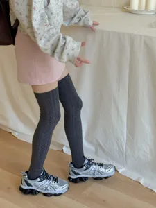 Cable knit over-the-knee socks for women, sweet style long knit stockings for autumn and winter.