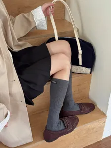 Korean style solid color mid-calf socks for women, comfortable cotton knit ribbed socks.