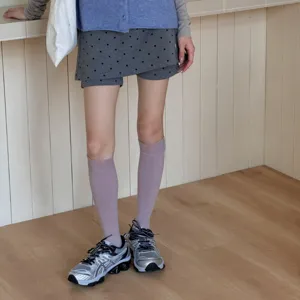 Solid color compression knee high socks for women, breathable athletic casual hosiery.
