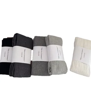 Solid color combed cotton ribbed stirrup tights main product image displaying assorted colors.