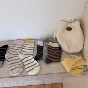 Japanese style striped mid-calf socks for women, comfortable cotton combed hosiery daily wear.