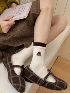 Cute cartoon embroidered mid-calf socks with brown ribbed cuff for women autumn winter daily.