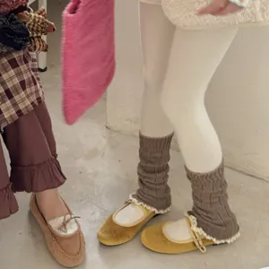 Cozy knit leg warmers with delicate lace trim, perfect for cute Y2K autumn and winter outfits.