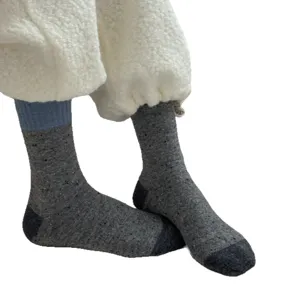 Merino wool colorblock mid-calf socks for winter warmth, cozy speckled knit daily wear.