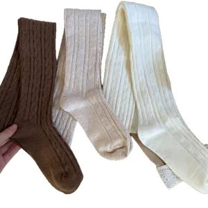 Cable knit over-the-knee high socks for women, vintage autumn winter long stockings, cozy style.