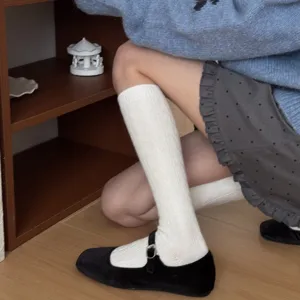 Japanese minimalist solid white ribbed calf socks for women, versatile autumn winter wear.