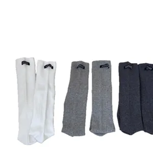 Korean style casual solid color calf socks cotton stackable socks with fashion letter label