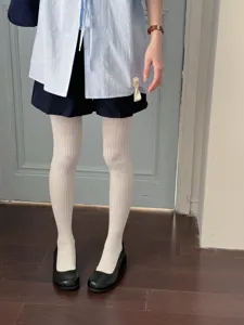 White ribbed tights for women, comfortable cotton leggings, stylish daily wear outfit base.