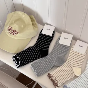 Striped ruffle mid-tube socks, sweet Japanese style daily cotton socks detail view.