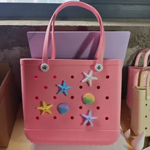 Ocean series pink EVA beach tote bag with cute starfish and seashell charms for summer.