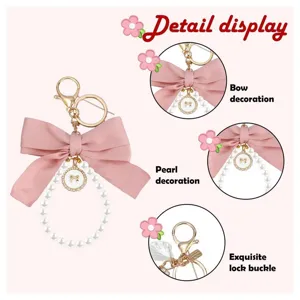 Cute bow pearl keychain for women, stylish bag charm with metal lock buckle and cute pink bow.